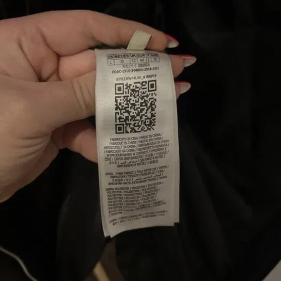 A warm winter jacket with Guess down filling - Picture 5 of 9